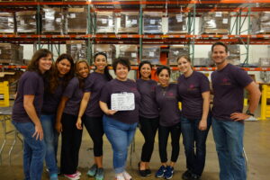 Cargo Eye Care of Las Colinas Volunteers at the Food Bank